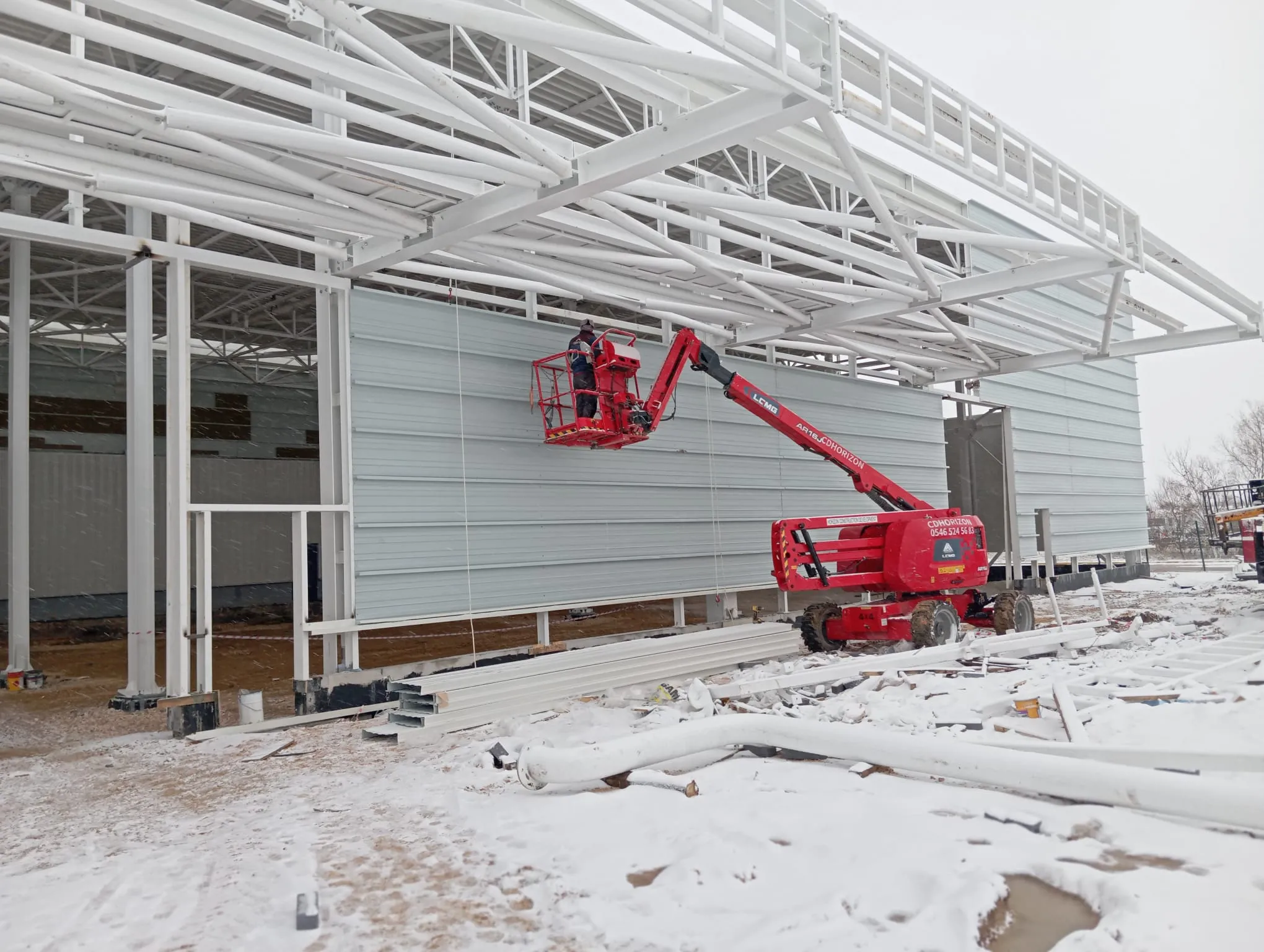 FORD OTOSAN ESKİŞEHİR 26X48 AMBAR RELOKASYON ÇATI VE CEPHE KAPLAMA İŞLERİ