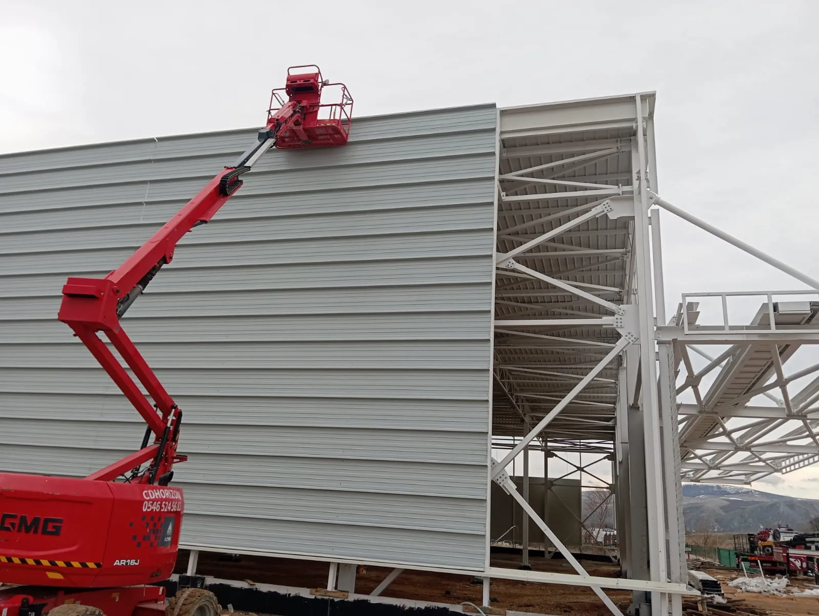 FORD OTOSAN ESKİŞEHİR 26X48 AMBAR RELOKASYON ÇATI VE CEPHE KAPLAMA İŞLERİ